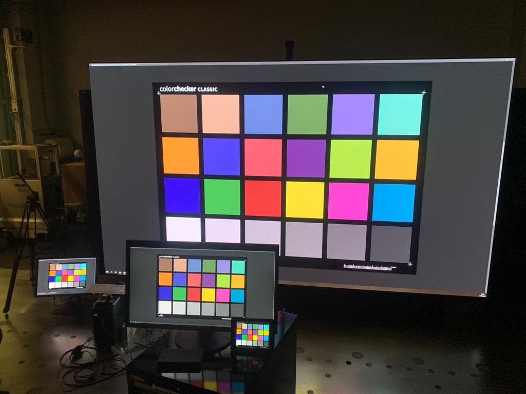 Calibrated color booth beside a TRUE dvLED wall during color validation