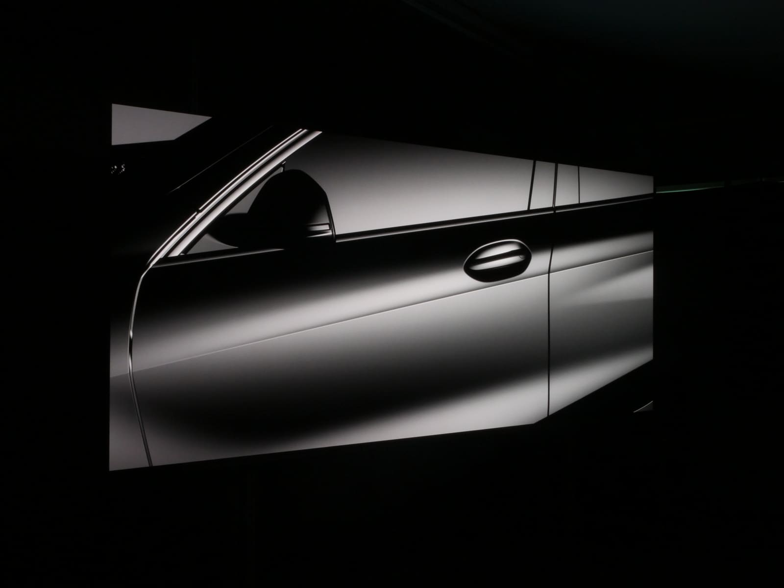 Silver car door reproduced in grey scale across a TRUE dvLED wall to judge highlight rendering