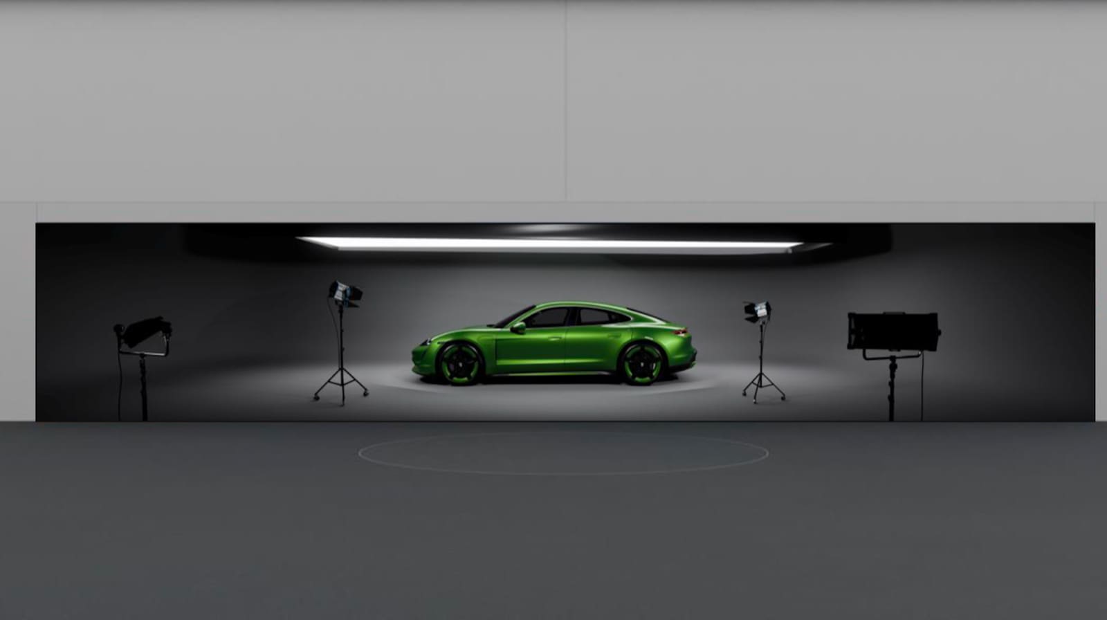 Green Porsche Taycan across a panoramic TRUE dvLED design studio wall