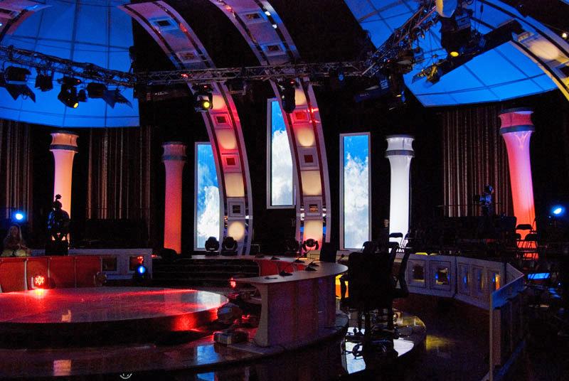 Domed studio ceiling with tall vertical TRUE dvLED slots between white columns