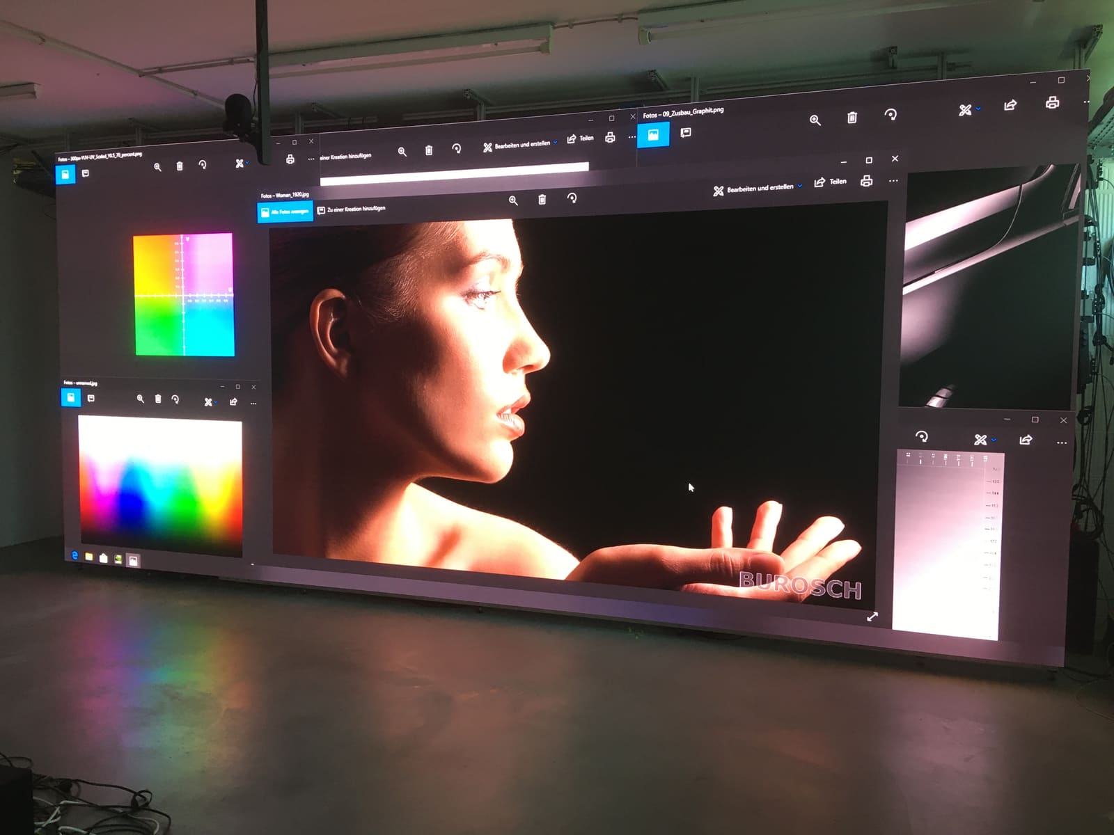 Reference portrait and colour gradient test patterns across a TRUE dvLED lab wall