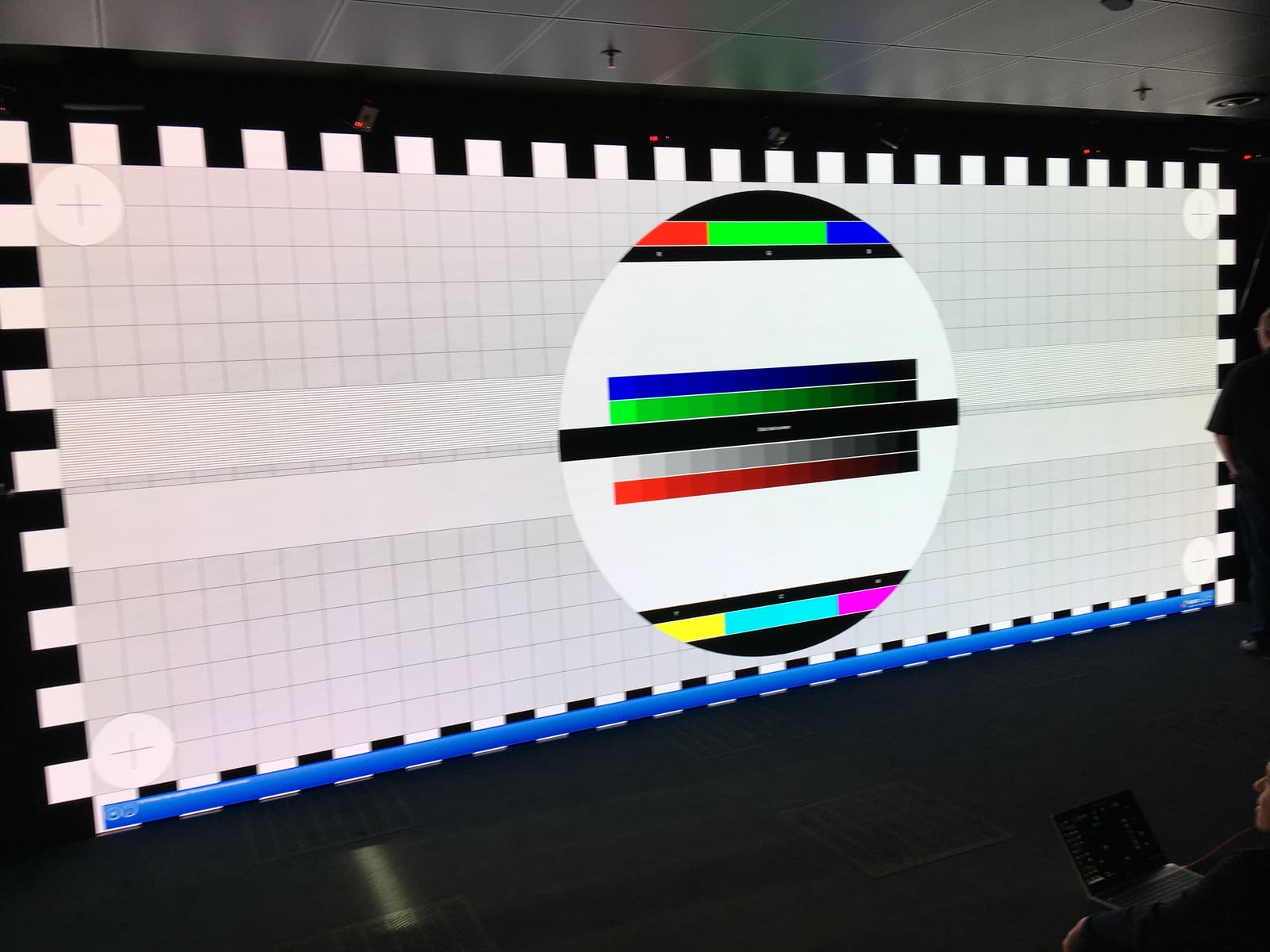 Full test chart with grey scale ramps and colour bars across a TRUE dvLED wall