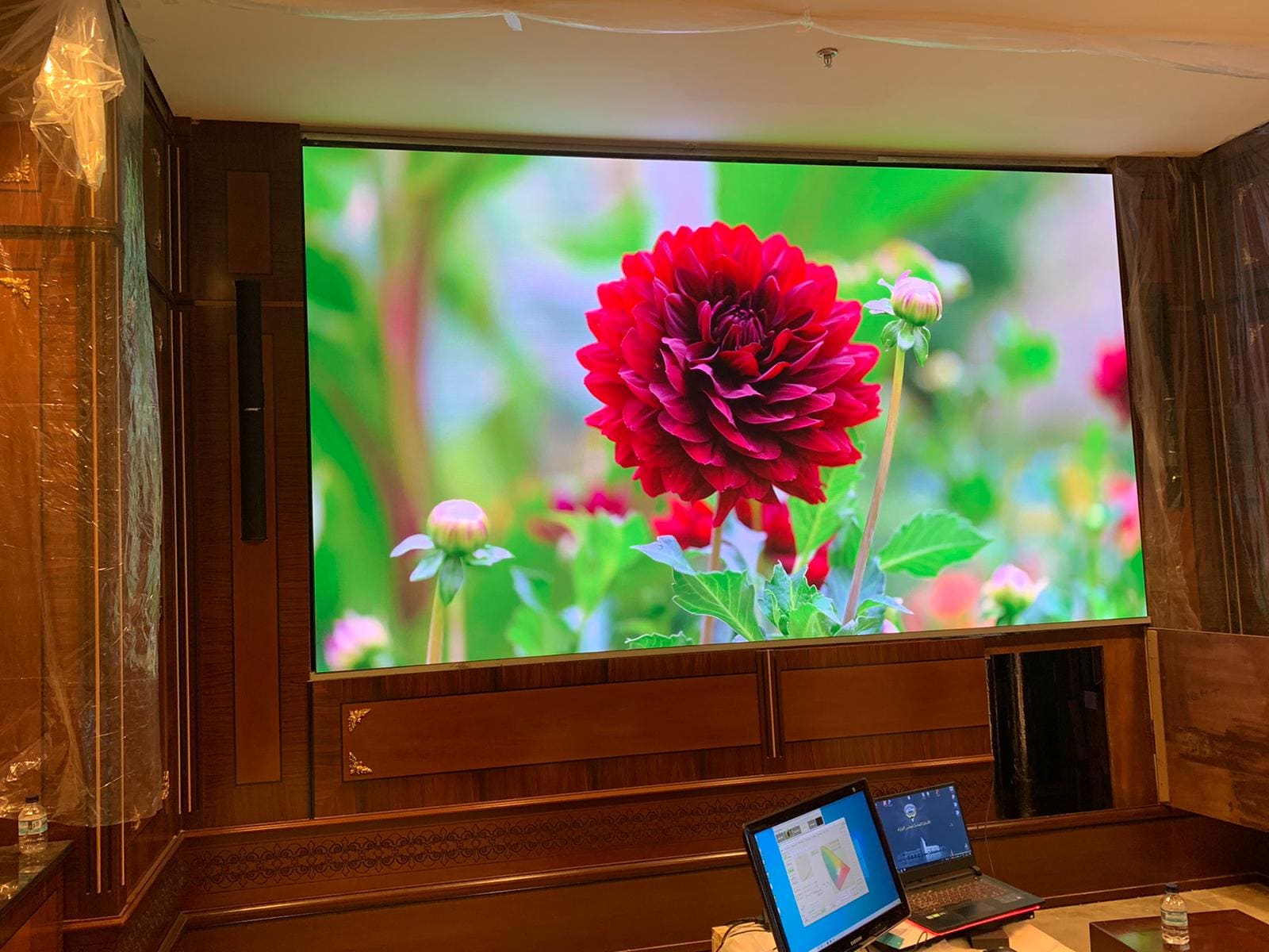 Wood panelled boardroom with a fine pitch TRUE dvLED wall and colour calibration software running