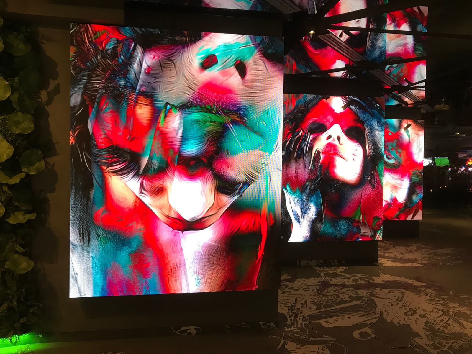 TRUE dvLED art panels receding through a casino gallery in Riga with planting and depth