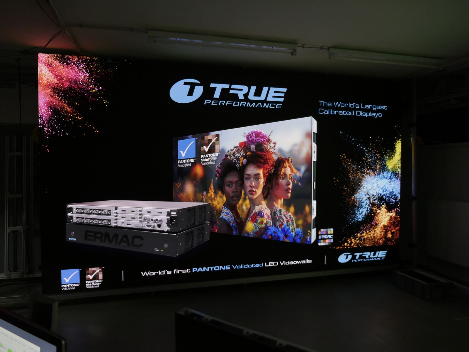 TRUE branded content on a dvLED wall showing the ERMAC processor and the Pantone validated claim
