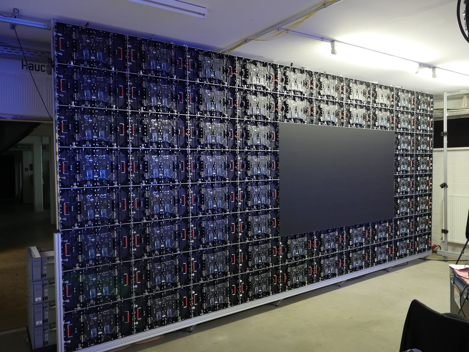 Rear of a large TRUE dvLED wall with cabinet internals and structured cabling
