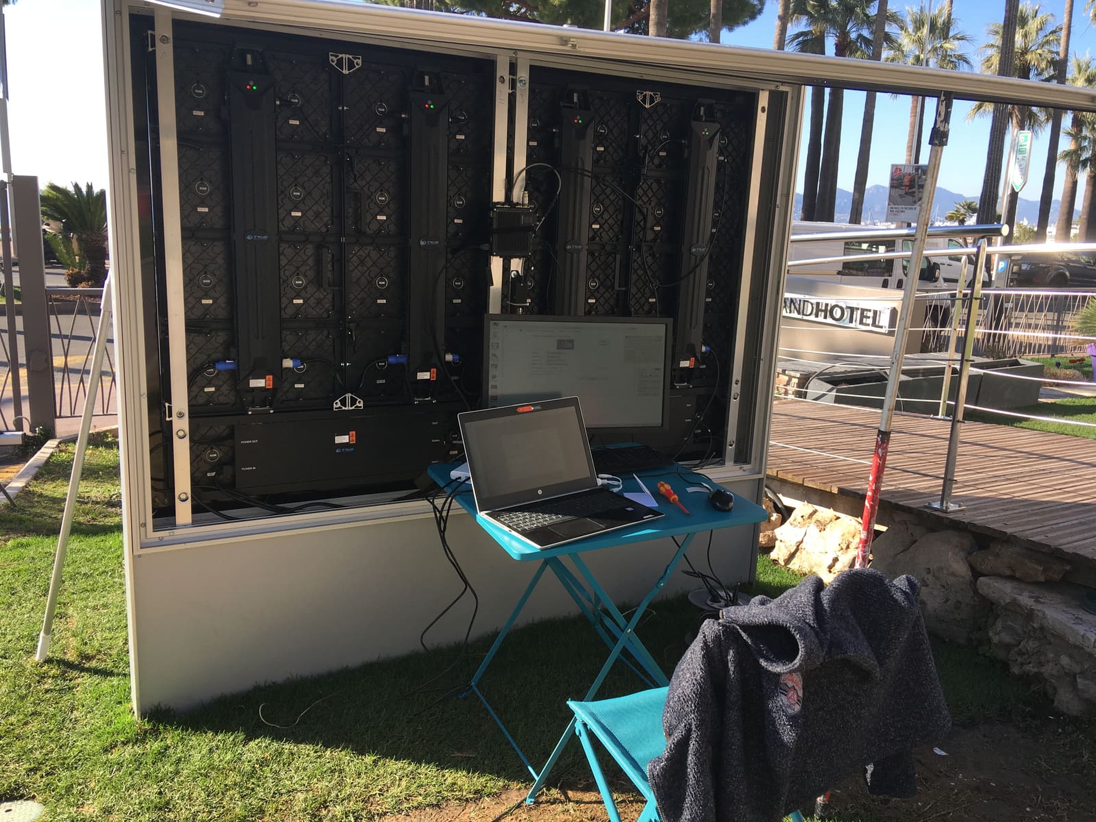 Open TRUE dvLED cabinet during on site commissioning with a laptop connected