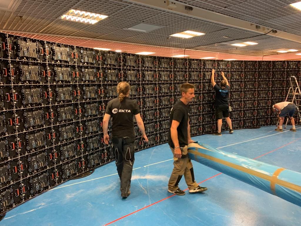 TRUE and EKTA crew building the rear structure of a large curved dvLED wall at the Cannes Film Festival