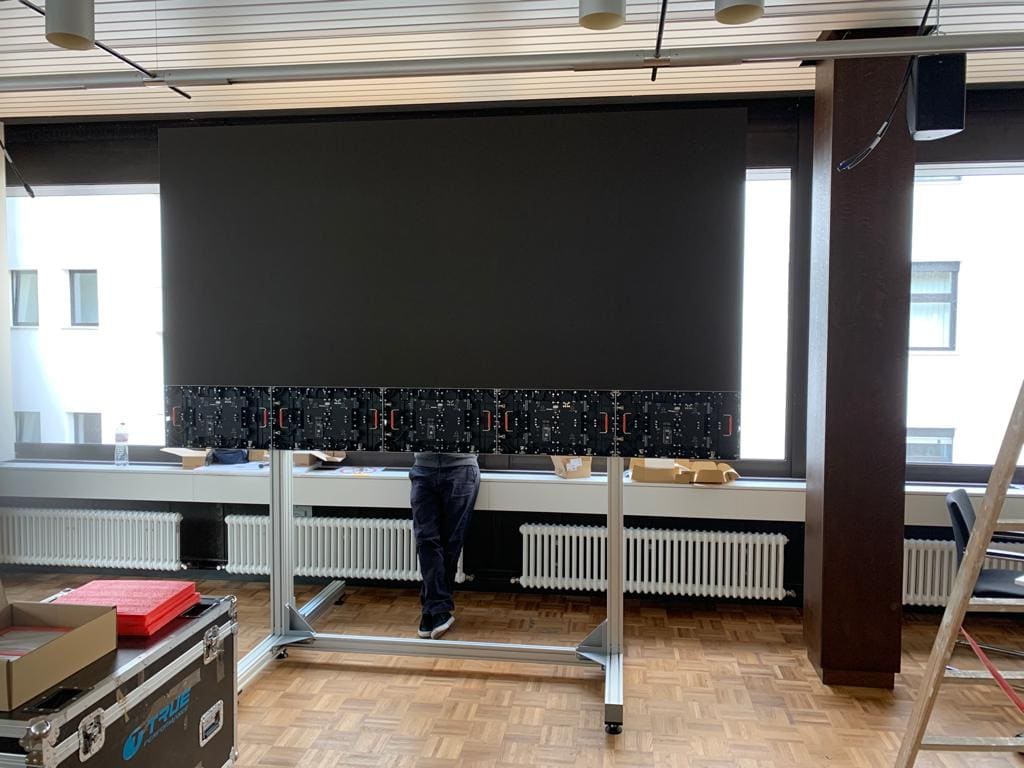 Office TRUE dvLED wall with the bottom panel row opened for service access