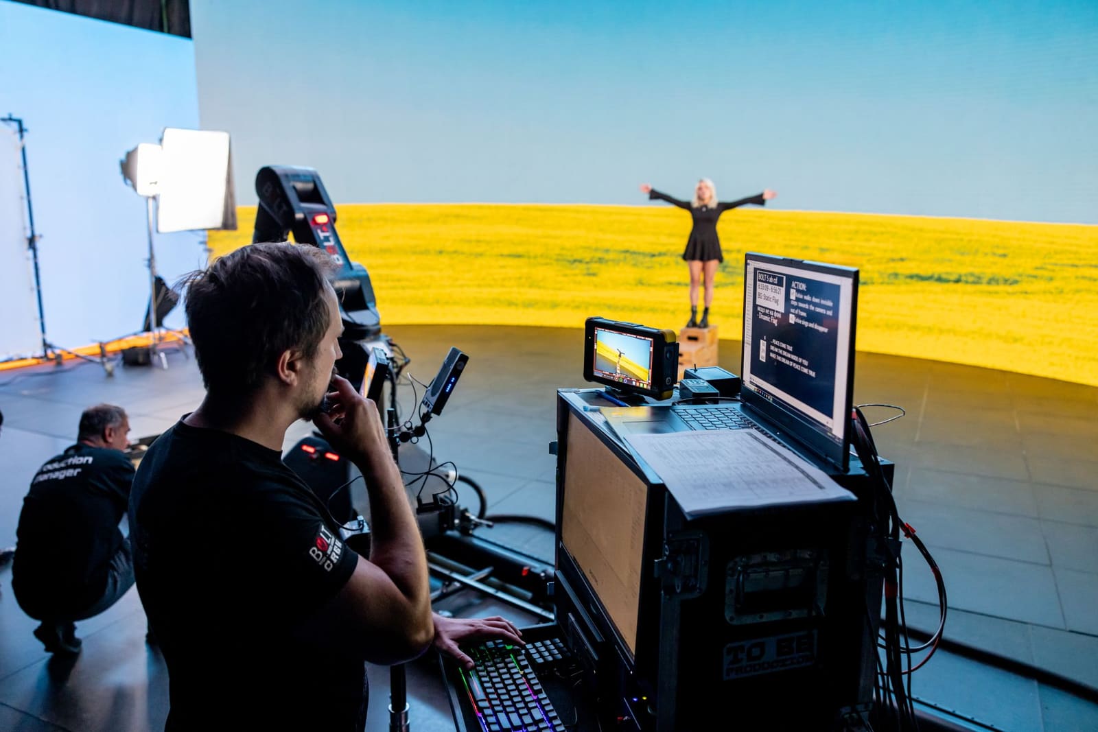 Yellow flower field on a TRUE dvLED volume with an operator at the control cart