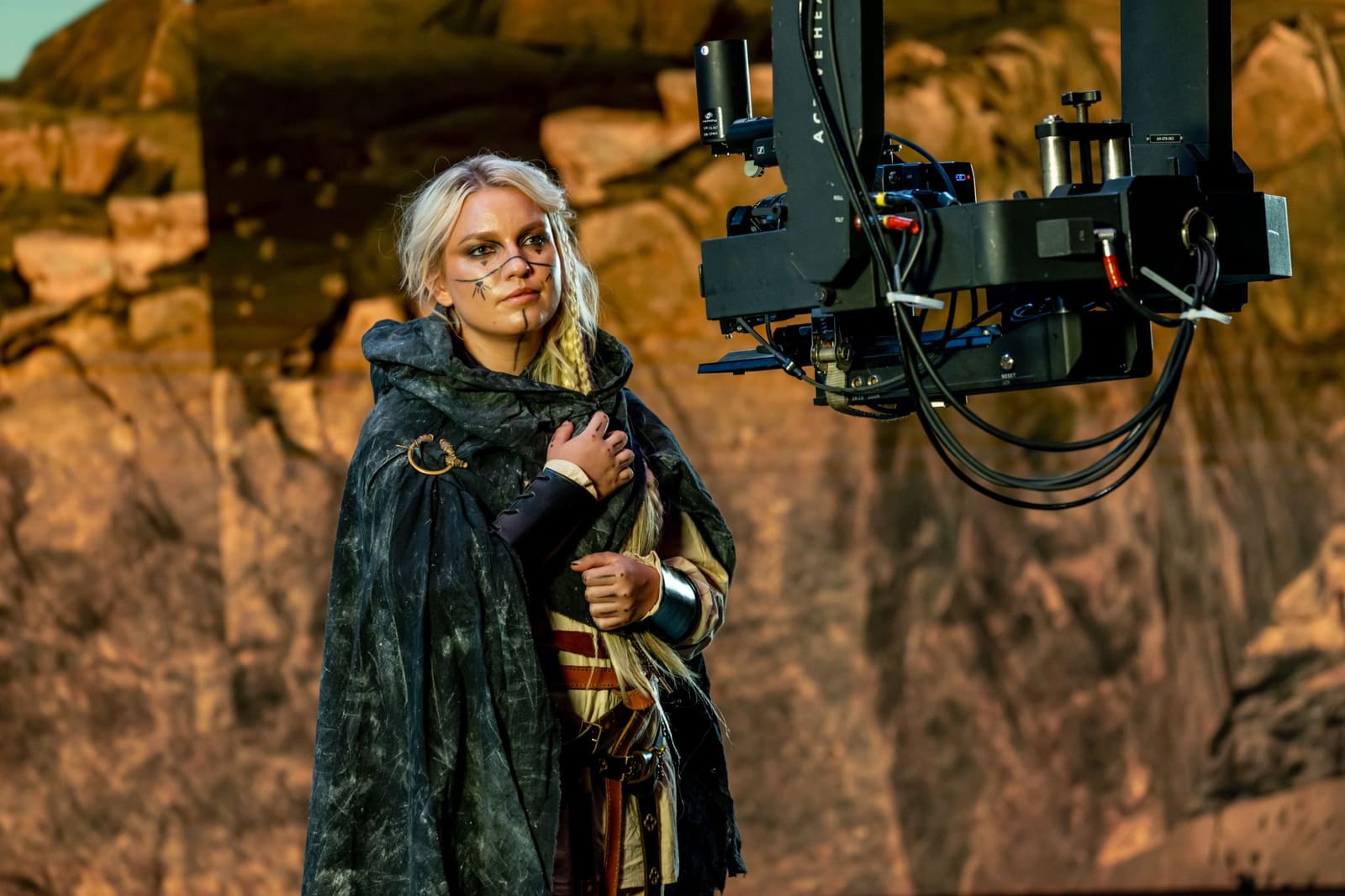 Remote head camera filming a costumed performer against a TRUE dvLED volume